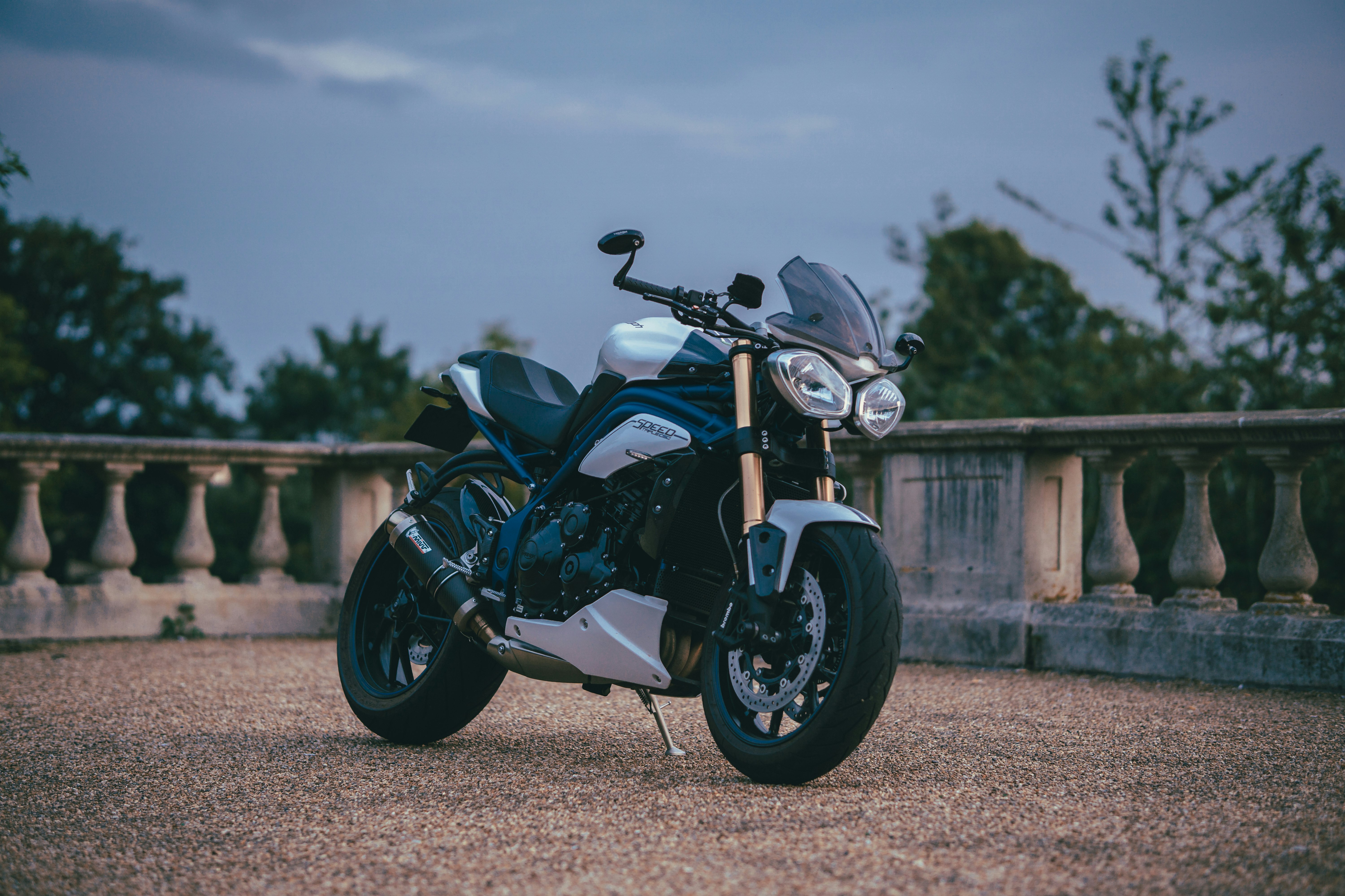 black and gray motorcycle on brown field during daytime